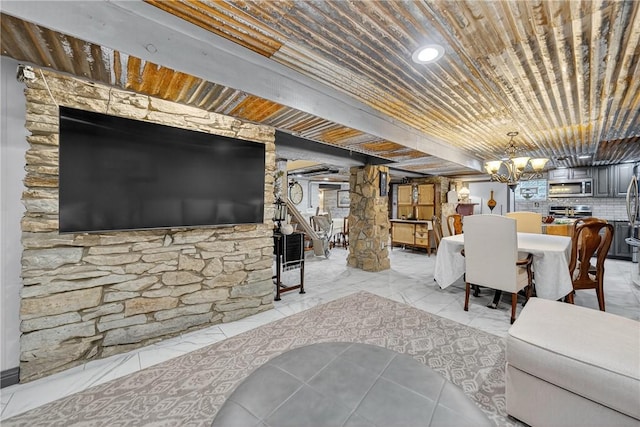 160 Railroad St, Hempfield Twp, PA 15665 - living room with wooden ceiling, a chandelier, and light marble finish flooring