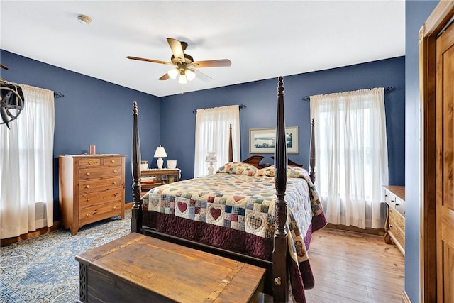 160 Railroad St, Hempfield Twp, PA 15665 - bedroom with multiple windows, hardwood / wood-style flooring, and a ceiling fan