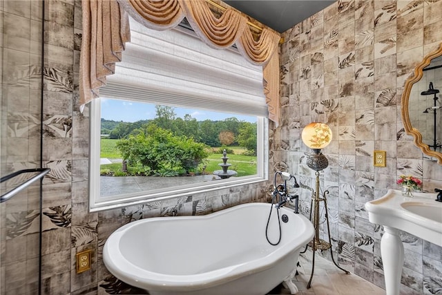 160 Railroad St, Hempfield Twp, PA 15665 - full bath with tile walls and a freestanding bath
