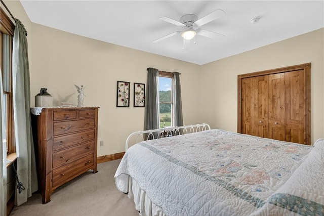 160 Railroad St, Hempfield Twp, PA 15665 - bedroom with light carpet, a closet, and a ceiling fan
