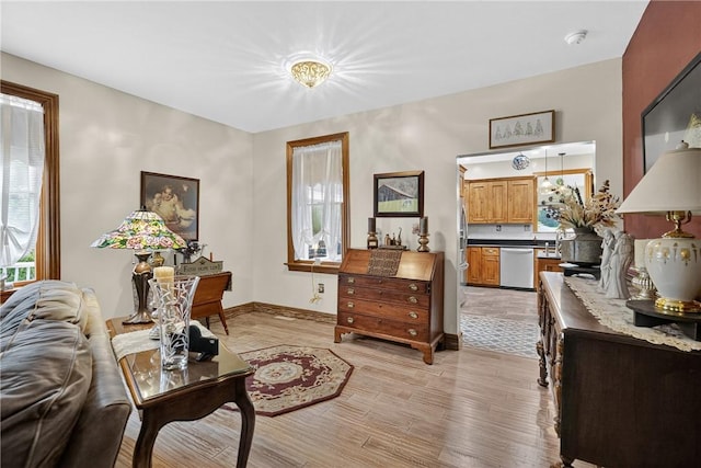 160 Railroad St, Hempfield Twp, PA 15665 - living area featuring light wood-style floors and baseboards