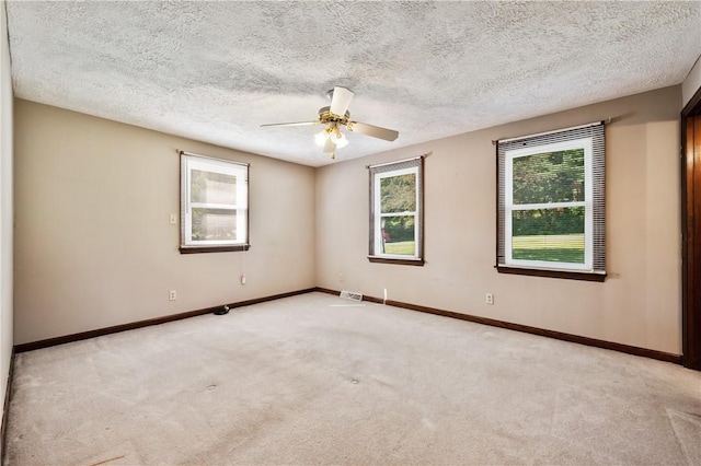 1222 Lakevue Dr, Penn Twp, PA 16002 - carpeted empty room featuring baseboards and ceiling fan