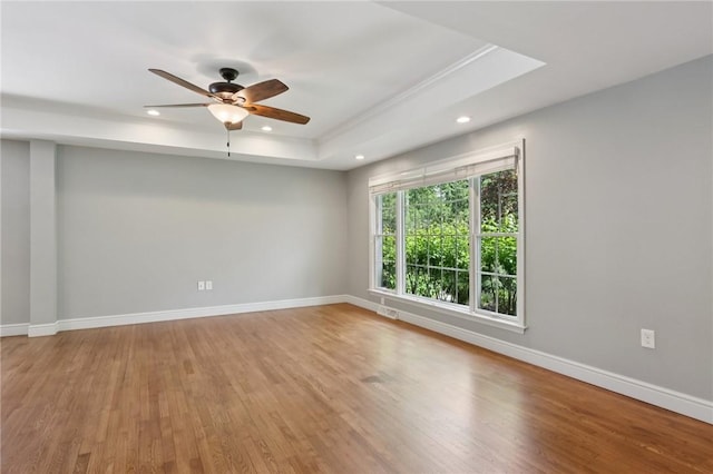200 Neville, Edgeworth, PA 15143 - spare room with wood finished floors, ceiling fan, a raised ceiling, and recessed lighting