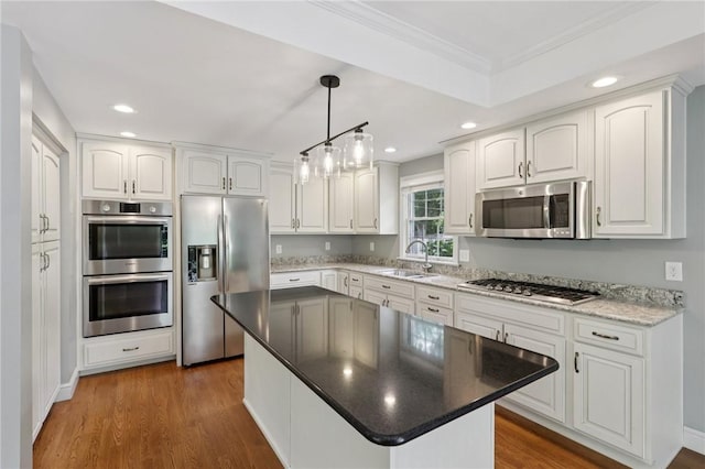 200 Neville, Edgeworth, PA 15143 - kitchen featuring appliances with stainless steel finishes, ornamental molding, white cabinets, dark wood-style flooring, and recessed lighting