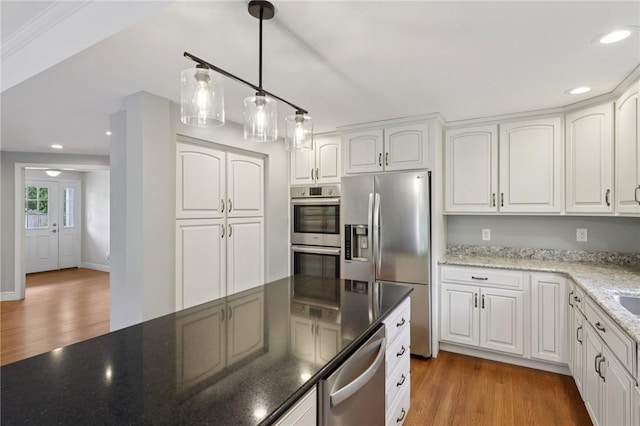 200 Neville, Edgeworth, PA 15143 - kitchen featuring stainless steel appliances, wood finished floors, white cabinets, and recessed lighting