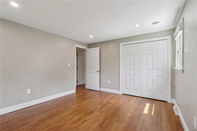 200 Neville, Edgeworth, PA 15143 - unfurnished bedroom with wood finished floors, a closet, and recessed lighting