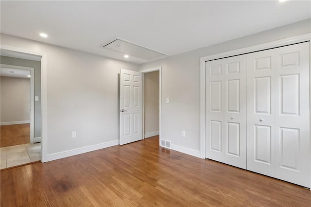 200 Neville, Edgeworth, PA 15143 - unfurnished bedroom featuring attic access, wood finished floors, recessed lighting, and a closet