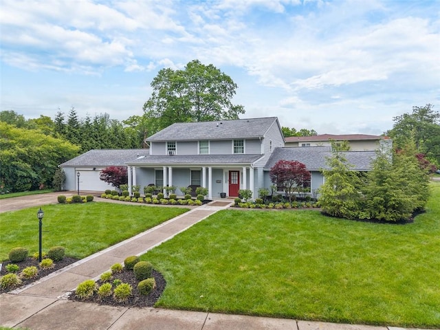 200 Neville, Edgeworth, PA 15143 - traditional-style house with a garage, covered porch, a front yard, driveway, and roof with shingles