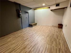 3329 Recker Dr, Baldwin Boro, PA 15227 - finished basement with a drop ceiling and wood finished floors