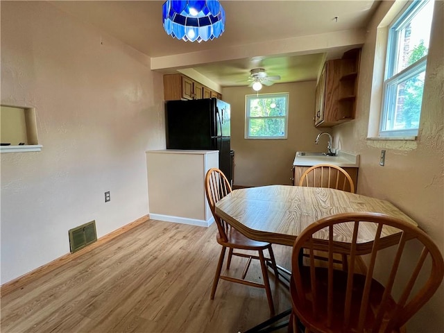3329 Recker Dr, Baldwin Boro, PA 15227 - dining space with light wood-style flooring and ceiling fan