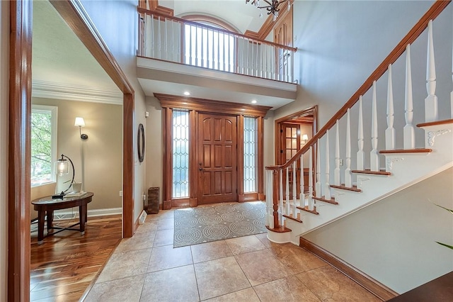 522 Salem Hts, Pine Twp, PA 15044 - foyer entrance with crown molding, stairs, a towering ceiling, and tile patterned flooring