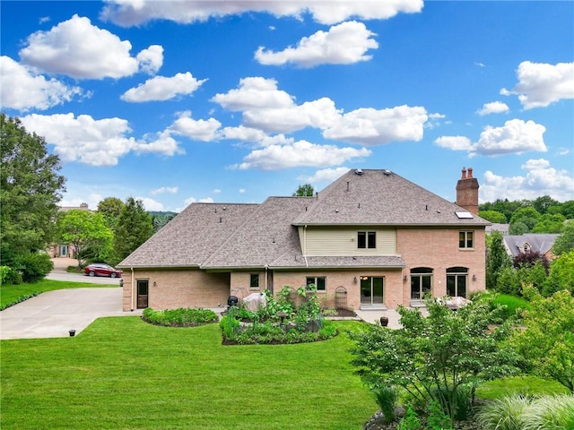 522 Salem Hts, Pine Twp, PA 15044 - rear view of house featuring brick siding, a yard, a chimney, and a shingled roof