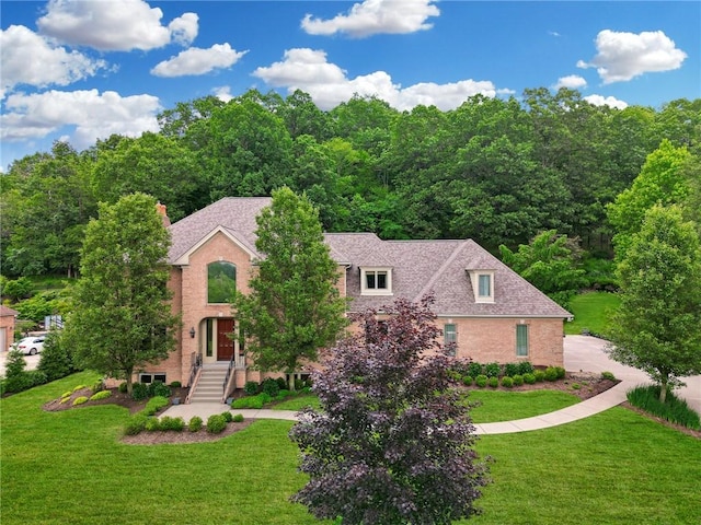 522 Salem Hts, Pine Twp, PA 15044 - view of front facade with brick siding, a front lawn, a chimney, and roof with shingles
