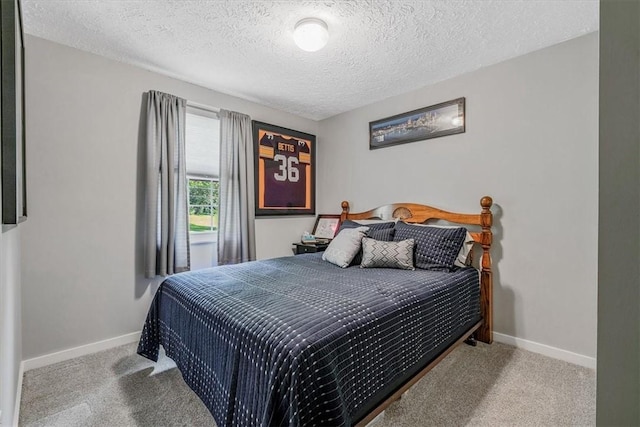 27 Watson St, Leet Twp, PA 15143 - carpeted bedroom featuring a textured ceiling and baseboards