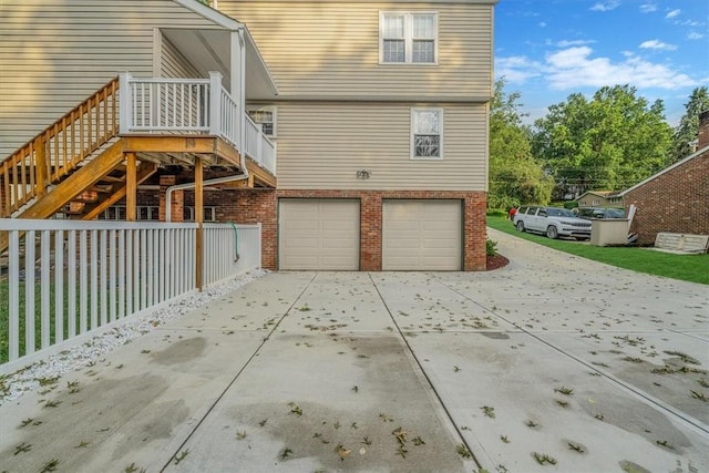 27 Watson St, Leet Twp, PA 15143 - view of property exterior featuring brick siding, concrete driveway, and an attached garage