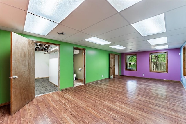 479 Bell Run Rd, Waynsbrg/Frankln Twp, PA 15362 - empty room featuring wood finished floors and a drop ceiling