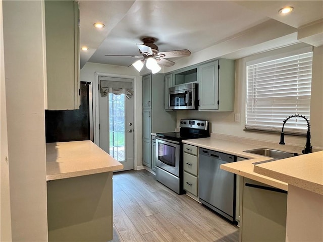 716 Vallevista Ave, Mt Lebanon, PA 15234 - kitchen featuring stainless steel appliances, light wood-style flooring, light countertops, ceiling fan, and recessed lighting