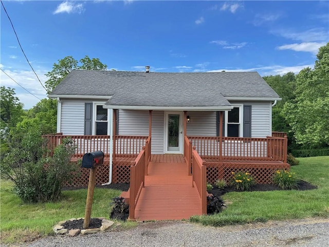 81 Baltimore St, Irwin, PA 15642 - view of front of property with roof with shingles and a wooden deck