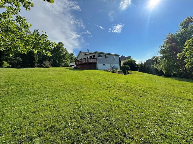 81 Baltimore St, Irwin, PA 15642 - view of green lawn featuring a deck