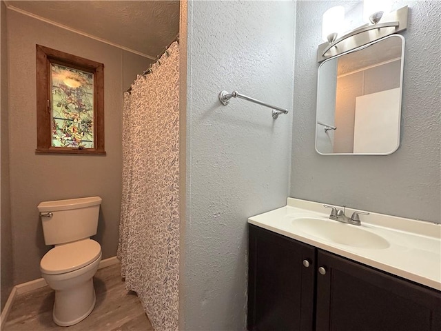 81 Baltimore St, Irwin, PA 15642 - full bath featuring vanity, wood finished floors, and a shower with curtain