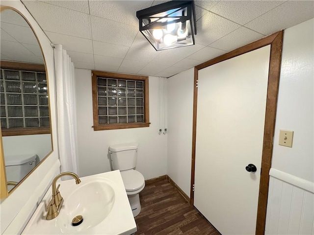 81 Baltimore St, Irwin, PA 15642 - bathroom with wood finished floors, vanity, and a shower with curtain