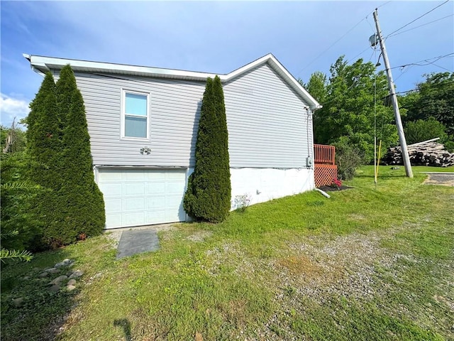 81 Baltimore St, Irwin, PA 15642 - view of home's exterior with a garage and a yard