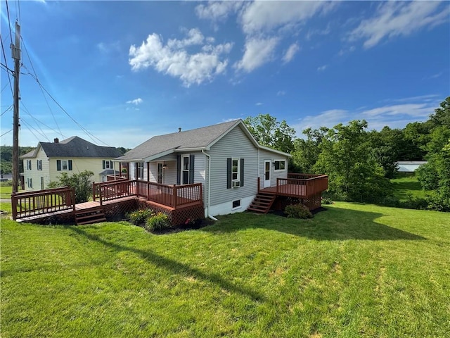 81 Baltimore St, Irwin, PA 15642 - back of property with a deck and a lawn