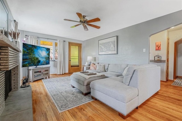 310 Glaser Ave, Bellevue, PA 15202 - living area featuring hardwood / wood-style flooring, ceiling fan, and a fireplace
