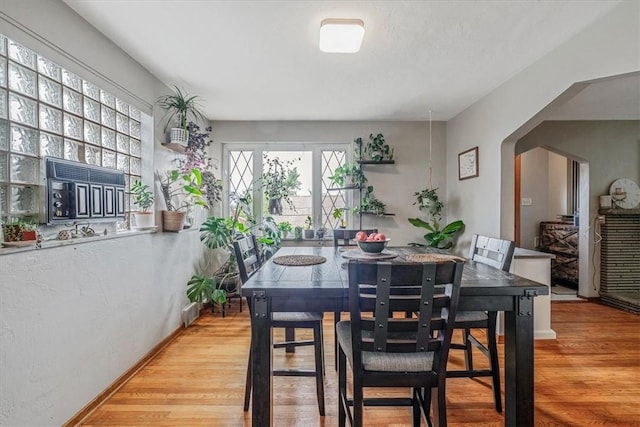 310 Glaser Ave, Bellevue, PA 15202 - dining area featuring wood finished floors and arched walkways