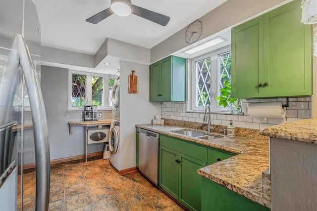 310 Glaser Ave, Bellevue, PA 15202 - kitchen featuring green cabinetry, appliances with stainless steel finishes, decorative backsplash, and healthy amount of natural light