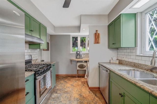 310 Glaser Ave, Bellevue, PA 15202 - kitchen featuring green cabinetry, appliances with stainless steel finishes, and under cabinet range hood