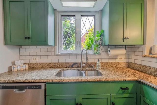 310 Glaser Ave, Bellevue, PA 15202 - kitchen featuring dishwasher, green cabinets, decorative backsplash, and light stone countertops