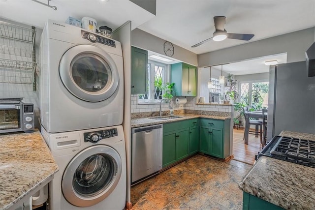 310 Glaser Ave, Bellevue, PA 15202 - washroom with stacked washer / drying machine and a ceiling fan
