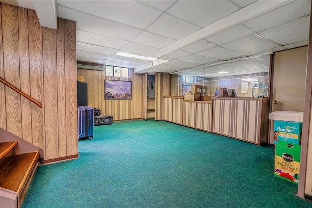310 Glaser Ave, Bellevue, PA 15202 - below grade area with carpet, wooden walls, a paneled ceiling, and stairway