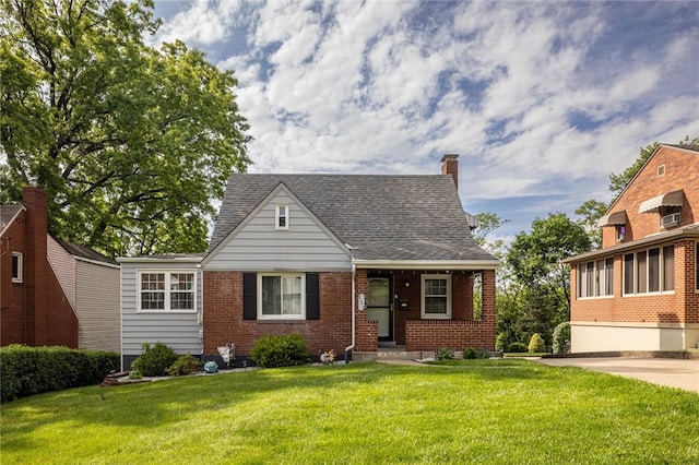 111 E Manilla, Green Tree, PA 15220 - view of front of home with a front lawn, brick siding, and a chimney