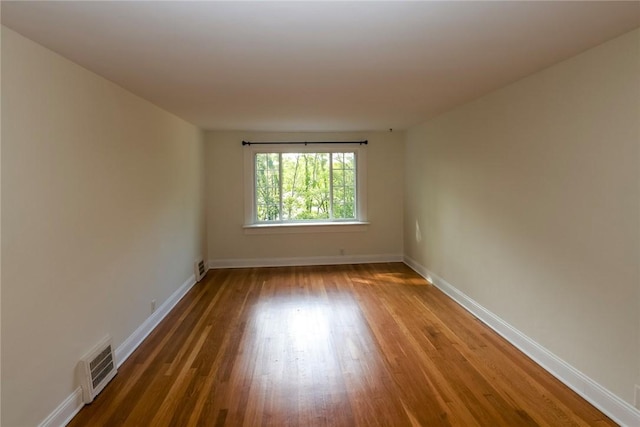 111 E Manilla, Green Tree, PA 15220 - empty room with wood finished floors and baseboards