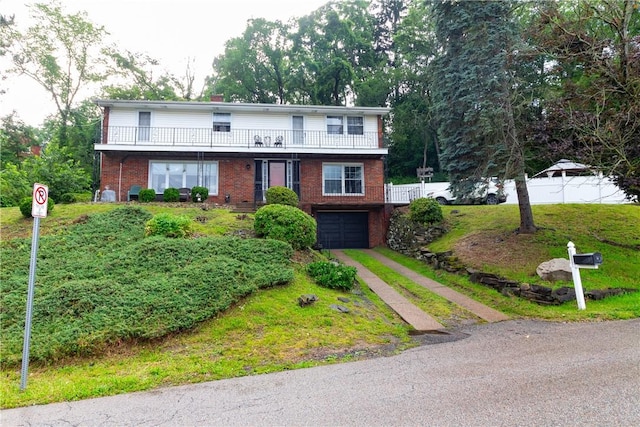 5401 Perrysville Rd, Ross Twp, PA 15229 - traditional-style home featuring driveway, brick siding, an attached garage, a balcony, and a chimney