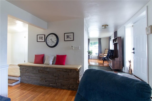 5401 Perrysville Rd, Ross Twp, PA 15229 - living area featuring wood finished floors and baseboard heating