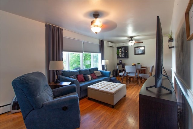 5401 Perrysville Rd, Ross Twp, PA 15229 - living room with an AC wall unit, a ceiling fan, and light wood-type flooring