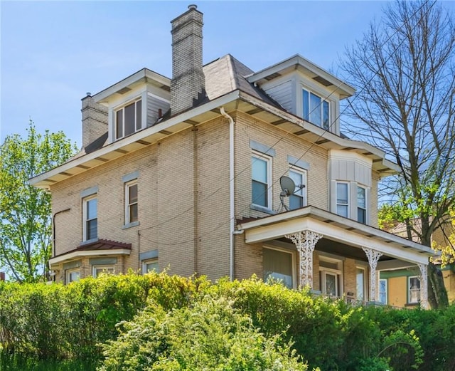 1503 Beechview Ave, Beechview, PA 15216 - view of side of property featuring brick siding and a chimney