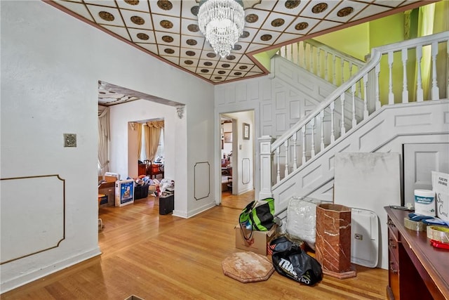 1503 Beechview Ave, Beechview, PA 15216 - foyer entrance featuring stairway, a chandelier, wood finished floors, and ornamental molding