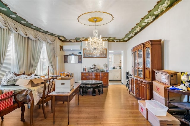 1503 Beechview Ave, Beechview, PA 15216 - dining space with a chandelier, a wall mounted air conditioner, and light wood-style floors