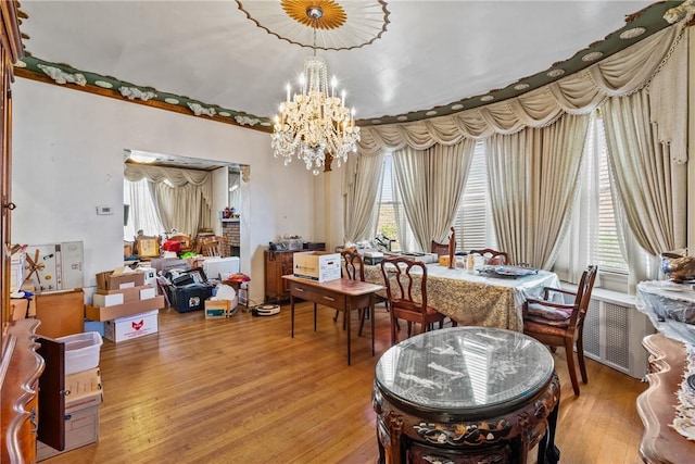 1503 Beechview Ave, Beechview, PA 15216 - dining space with radiator, a chandelier, and light wood finished floors