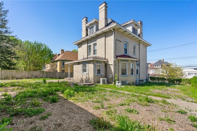 1503 Beechview Ave, Beechview, PA 15216 - rear view of house with a chimney and brick siding