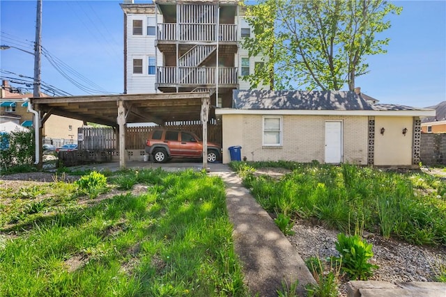 1503 Beechview Ave, Beechview, PA 15216 - rear view of house with brick siding and a carport