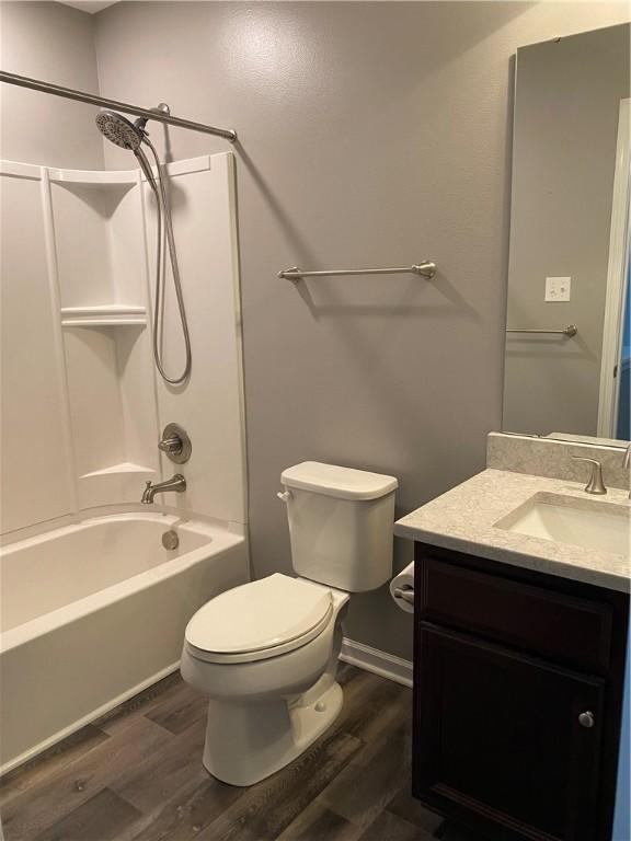 1028 Oakbrooke Dr, Canonsburg, PA 15317 - full bath featuring wood finished floors, vanity, and shower / bathtub combination