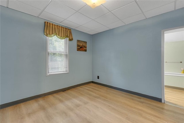 248 Shaffer Rd, North Sewickley Twp, PA 15010 - empty room featuring a paneled ceiling and light wood-type flooring
