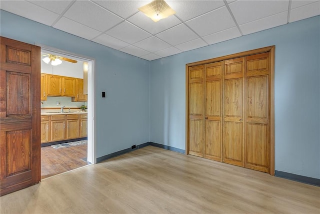 248 Shaffer Rd, North Sewickley Twp, PA 15010 - unfurnished bedroom with light wood-style floors, a drop ceiling, a closet, and ensuite bathroom