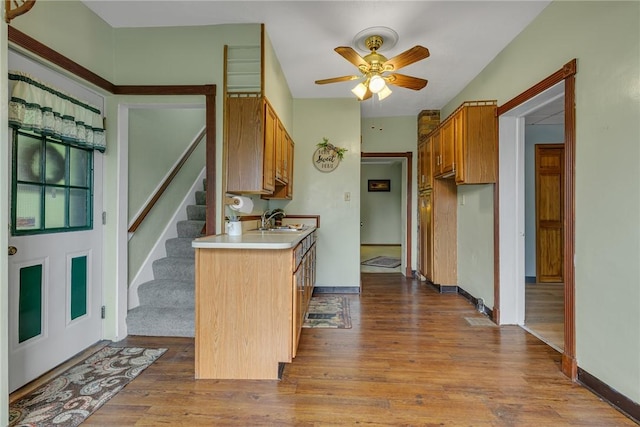 248 Shaffer Rd, North Sewickley Twp, PA 15010 - kitchen featuring dark wood finished floors, ceiling fan, light countertops, and brown cabinets