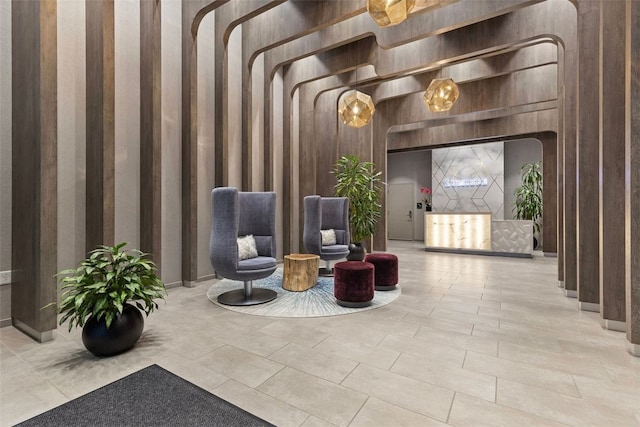 350 Oliver Ave Unit 1301/1401, Downtown Pgh, PA 15222 - building lobby featuring a towering ceiling and wooden walls